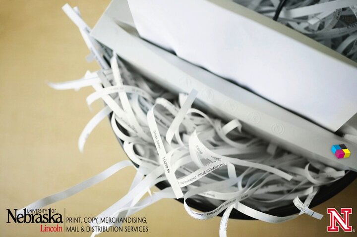 image of paper being shredded